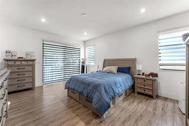 a bedroom with a bed and furniture