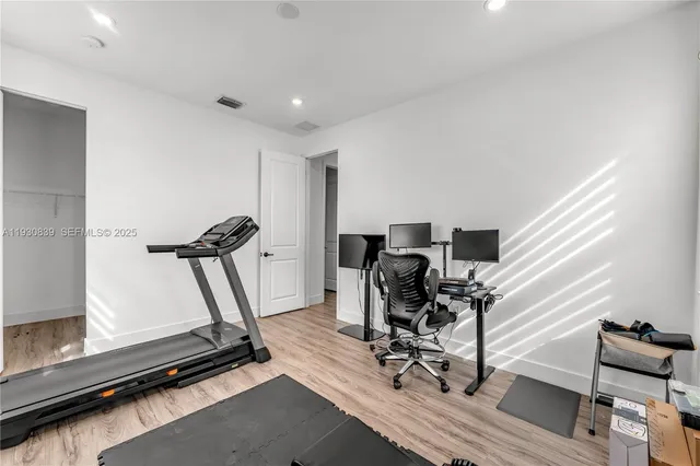 a view of a room with gym equipment