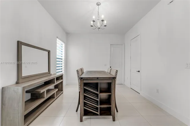 a view of a workspace with furniture