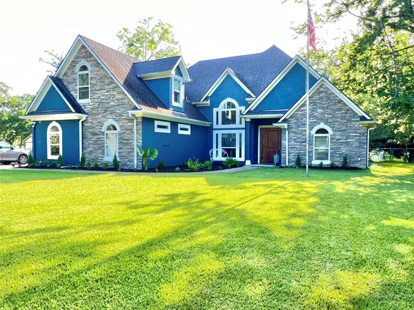 a view of a house with a swimming pool