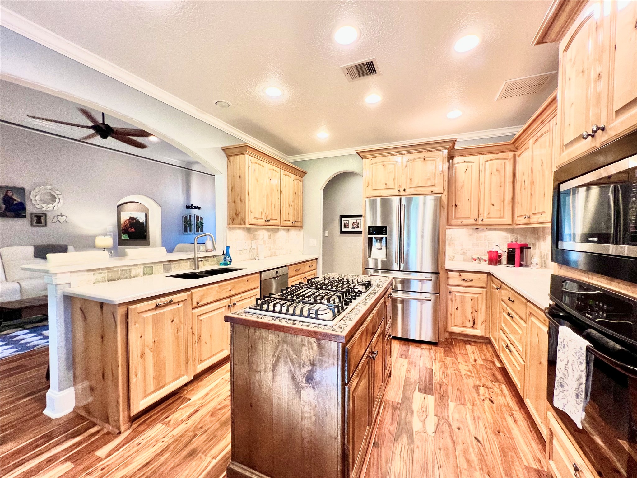 6714 Jay Road Hitchcock, TX 77563 - Photo 15 of 50 a kitchen that has a lot of cabinets in it