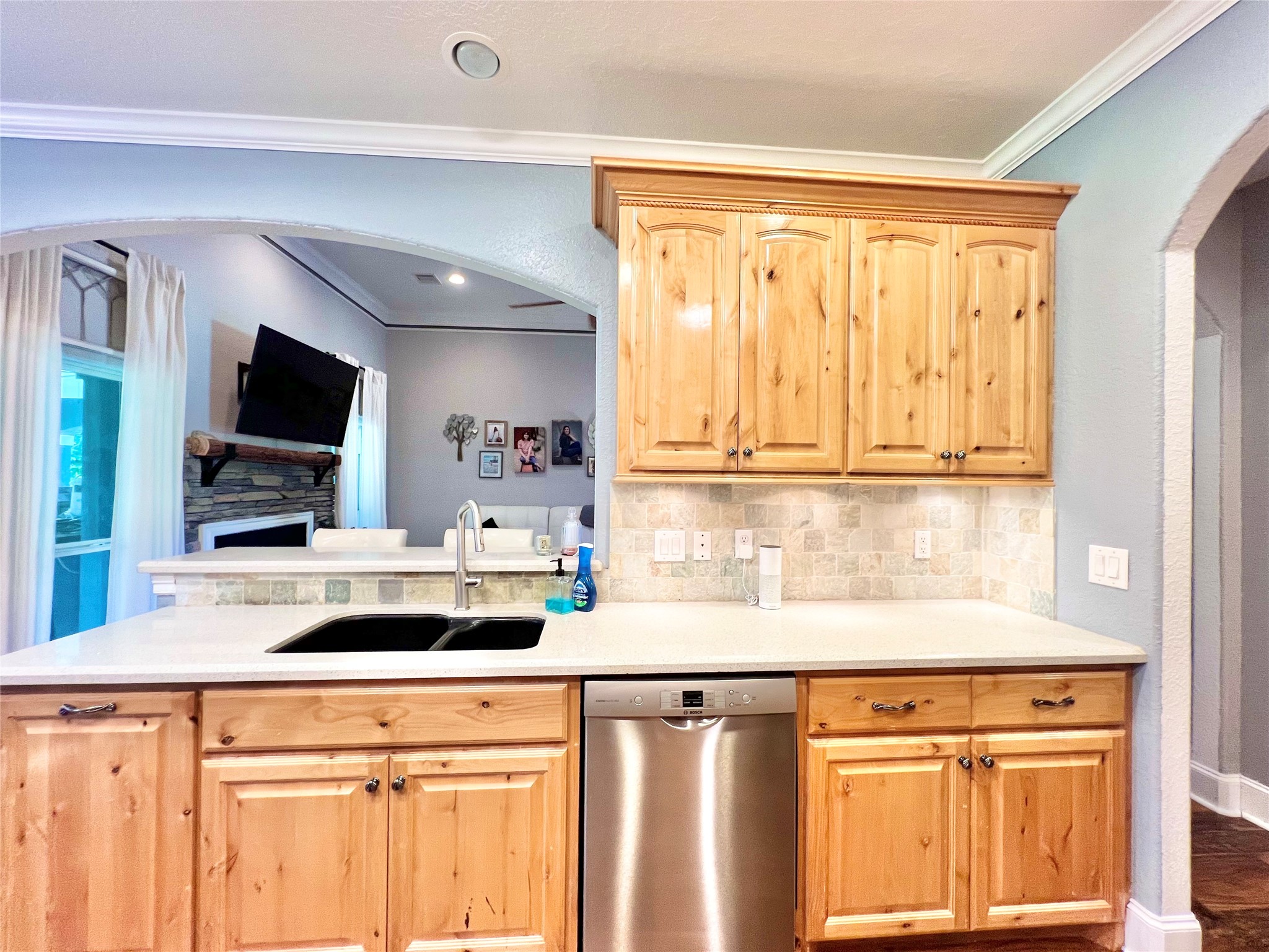 6714 Jay Road Hitchcock, TX 77563 - Photo 20 of 50 a kitchen with stainless steel appliances white cabinets and a refrigerator