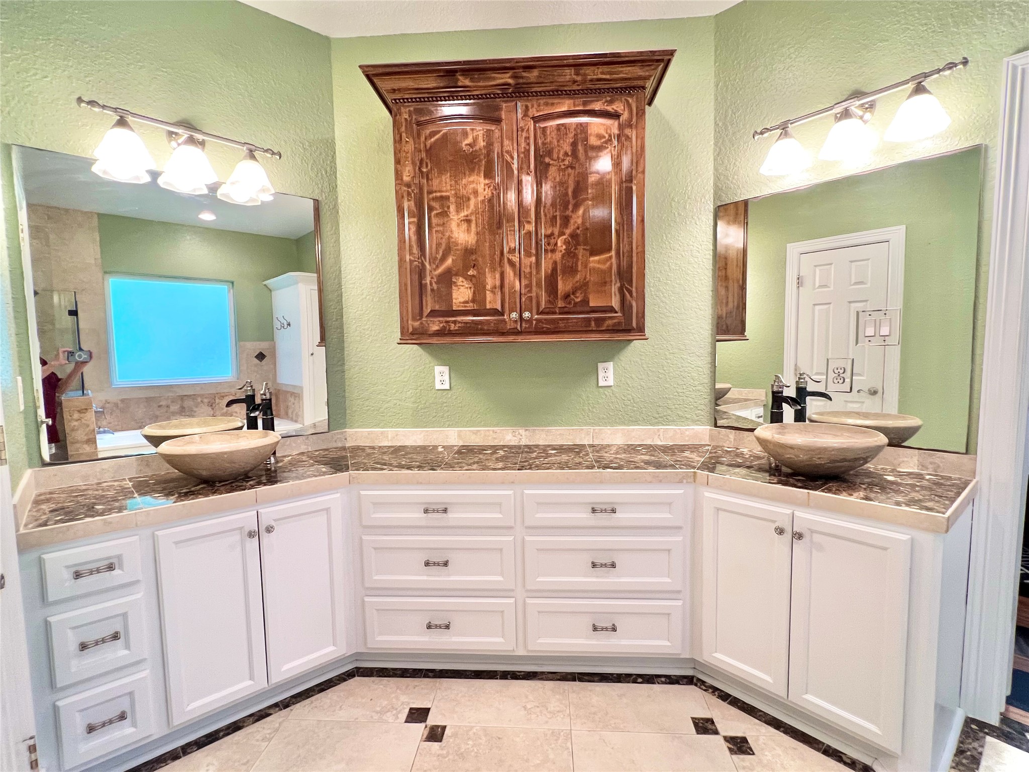 6714 Jay Road Hitchcock, TX 77563 - Photo 26 of 50 a bathroom with a sink a vanity and a mirror
