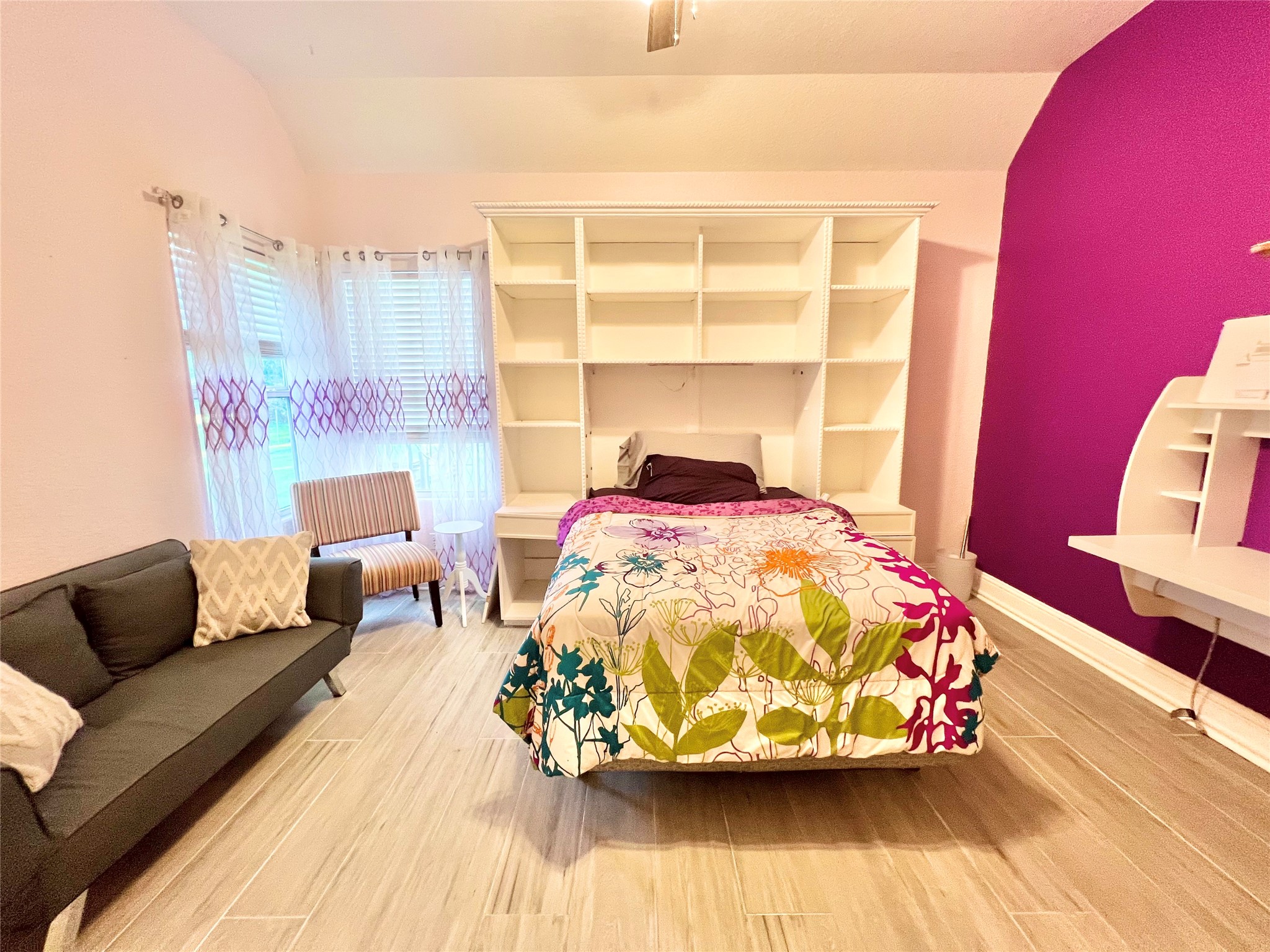 6714 Jay Road Hitchcock, TX 77563 - Photo 36 of 50 a living room with furniture and a wooden floor