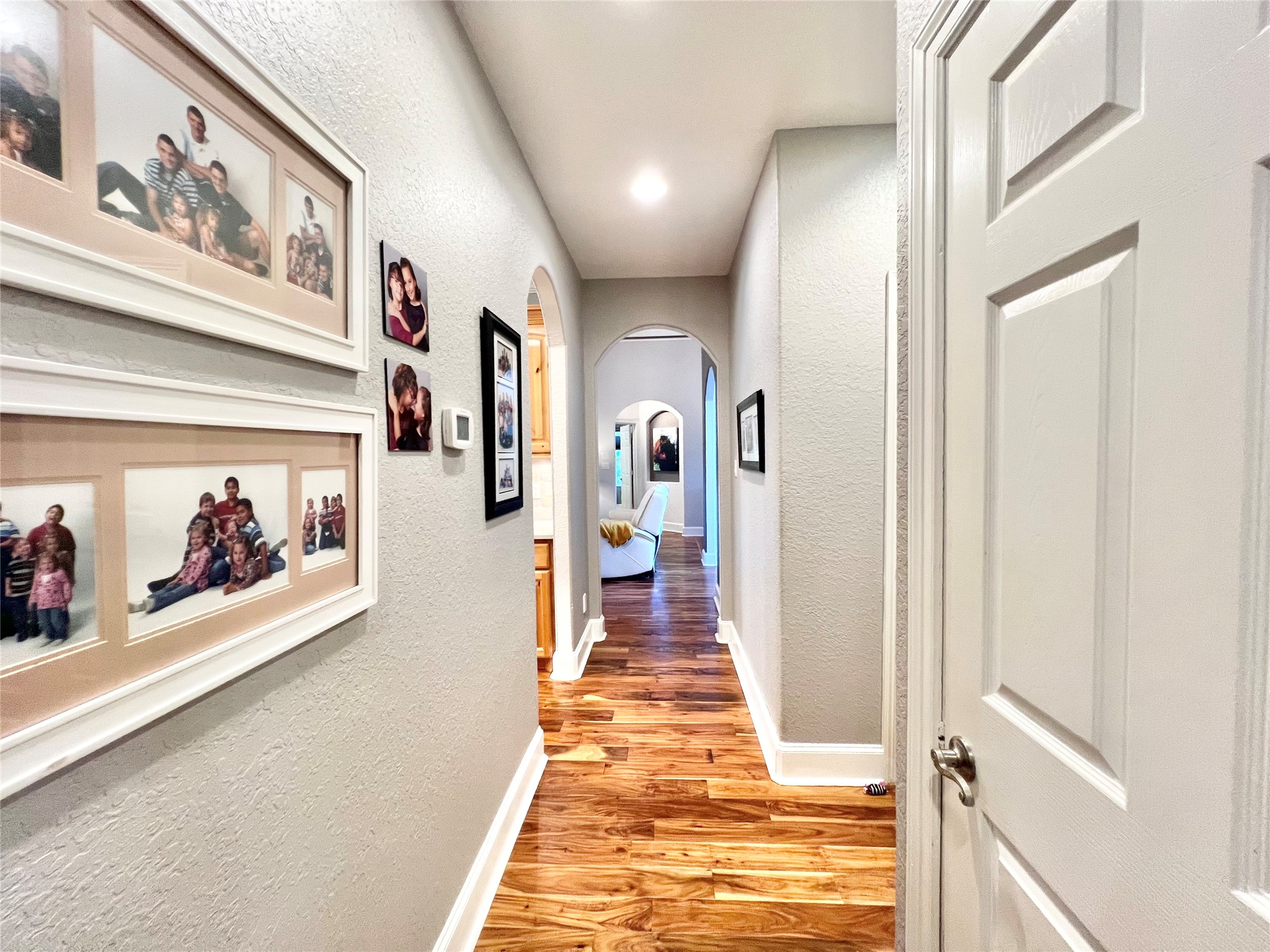6714 Jay Road Hitchcock, TX 77563 - Photo 38 of 50 a view of a hallway with wooden floor