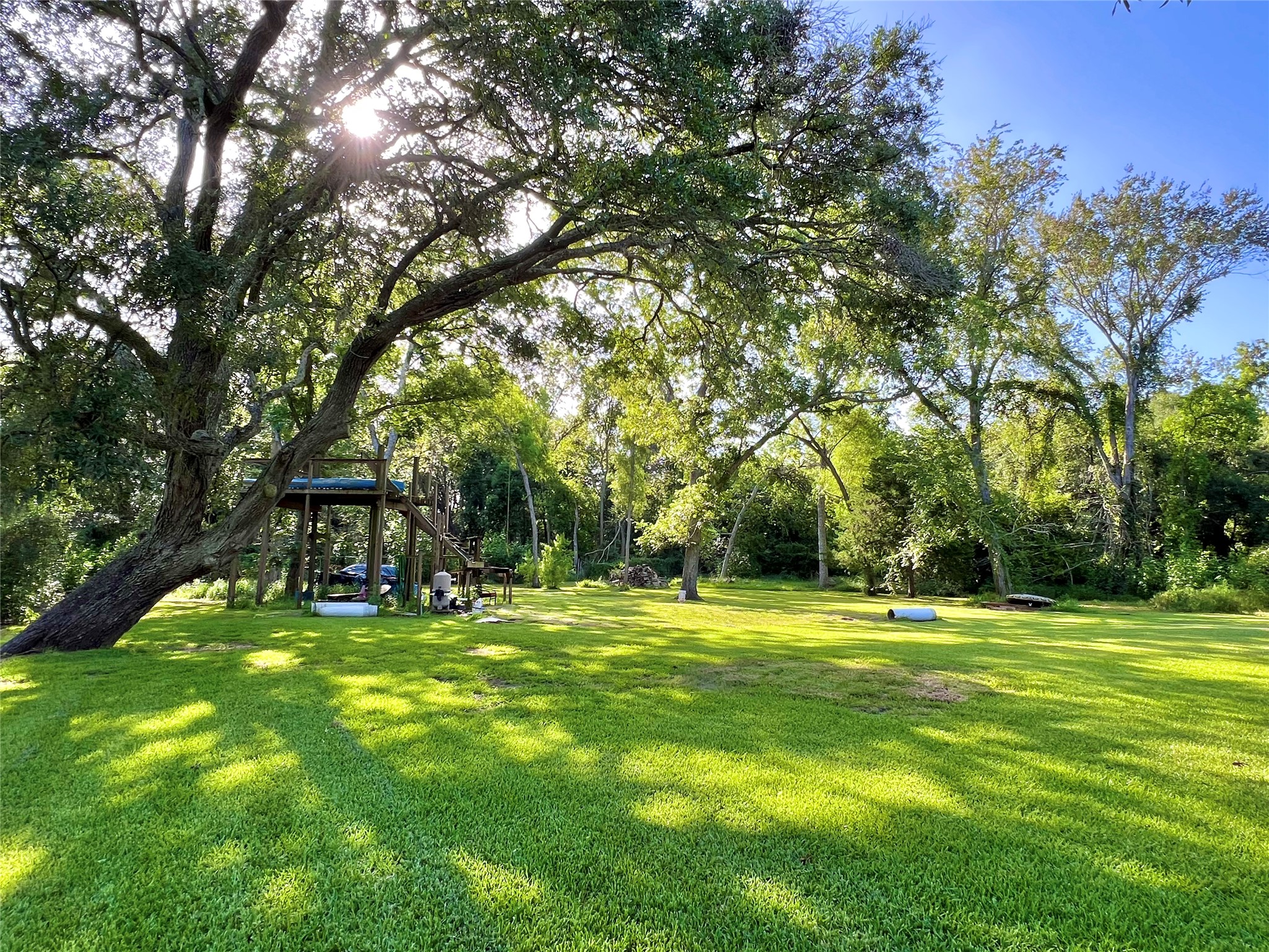 6714 Jay Road Hitchcock, TX 77563 - Photo 47 of 50 a swimming pool with outdoor seating and yard