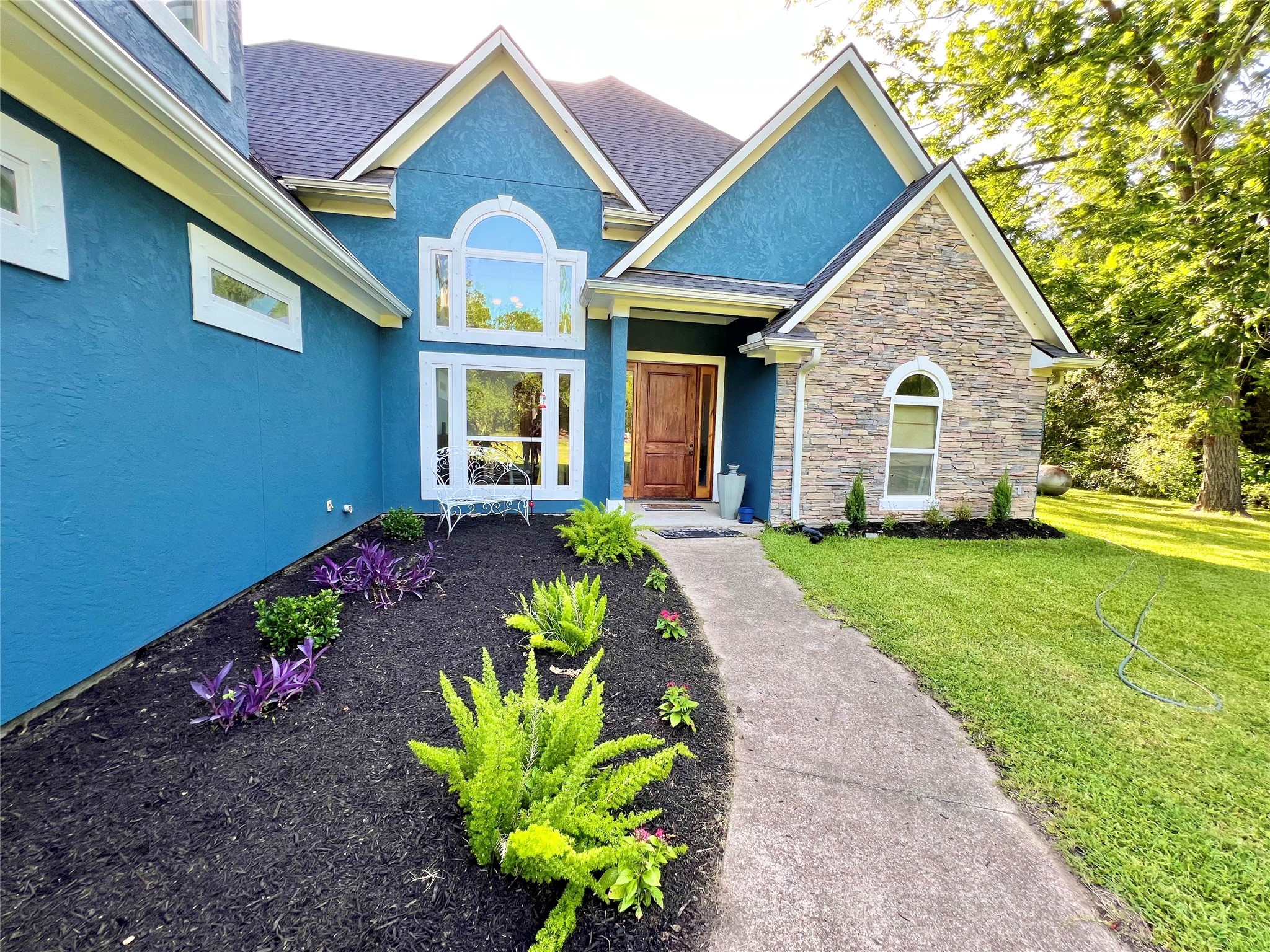 6714 Jay Road Hitchcock, TX 77563 - Photo 6 of 50 a front view of a house with a yard