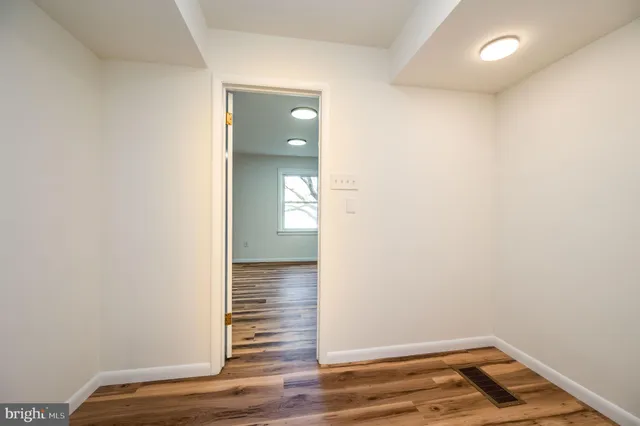 a view of a bathroom with a sink and a window
