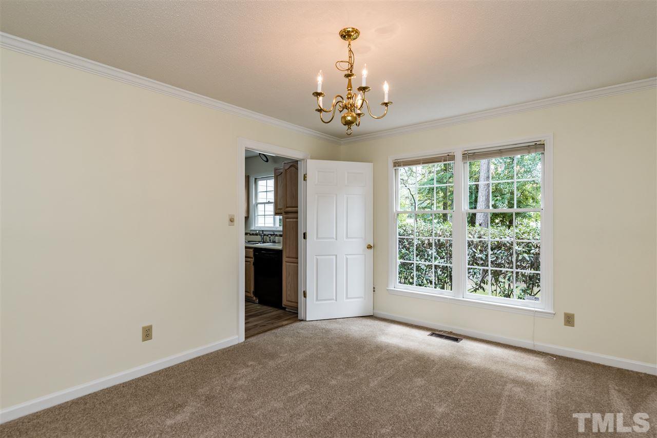 6012 Tarleton Court Raleigh, NC 27616 - Photo 6 of 25 a view of an empty room with a window