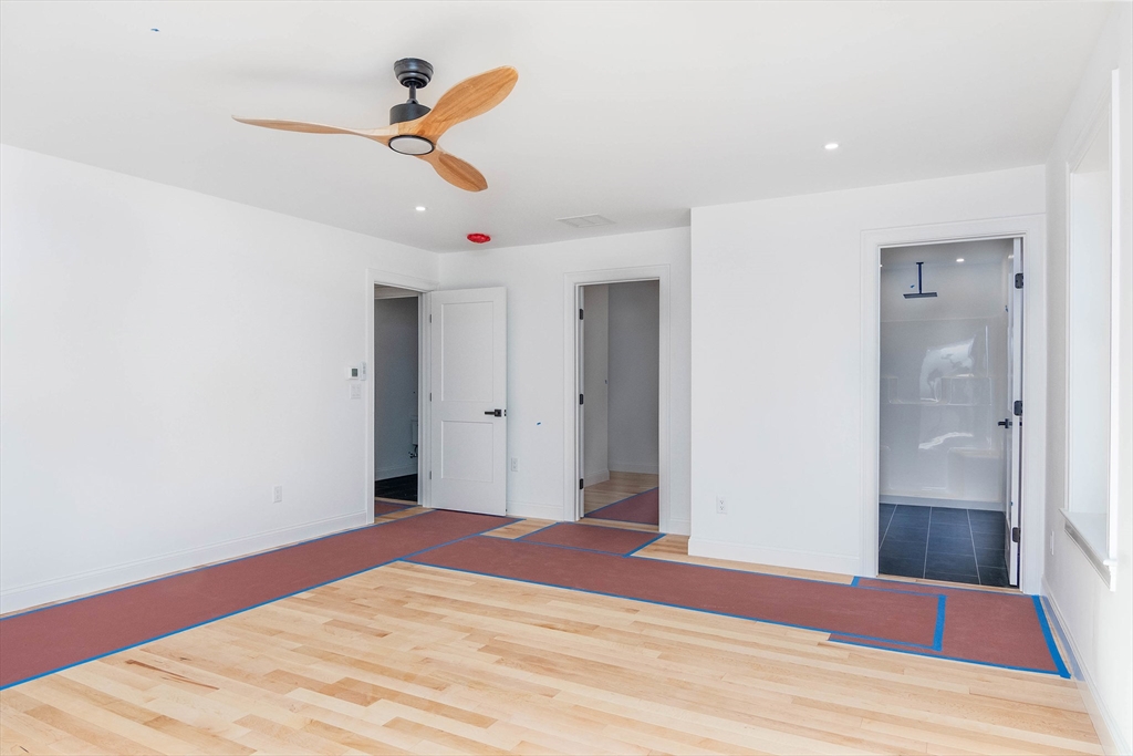 3 Crest Avenue Worcester, MA 01607 - Photo 30 of 34 a view of a room with wooden floor and ceiling fan