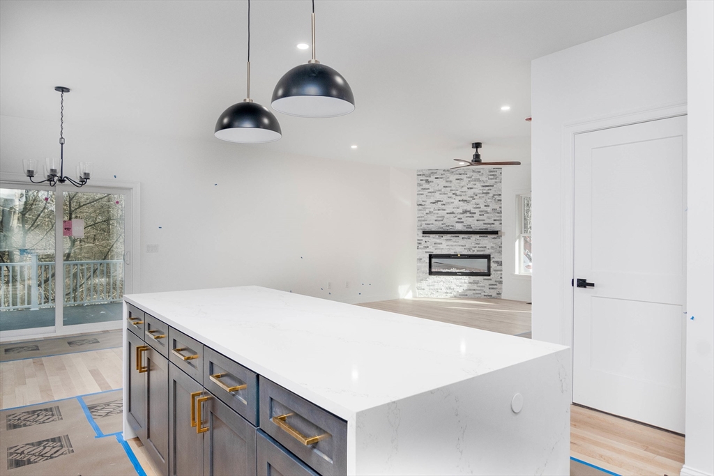 3 Crest Avenue Worcester, MA 01607 - Photo 3 of 34 a kitchen with a sink a stove and a refrigerator