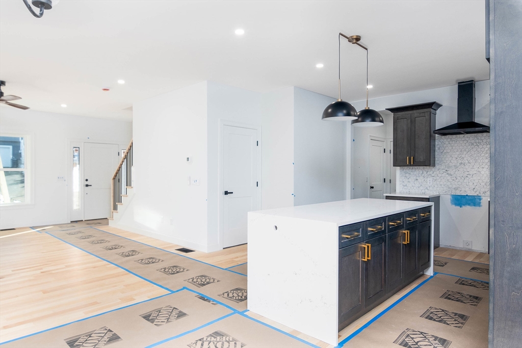 3 Crest Avenue Worcester, MA 01607 - Photo 4 of 34 a kitchen with a stove and a sink
