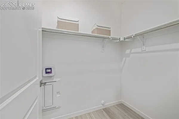 a view of an empty walk in closet