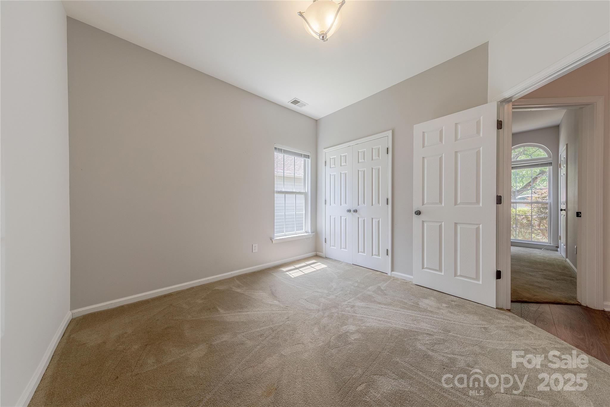 901 Clearbrook Road Matthews, NC 28105 - Photo 25 of 37 an empty room with closet area