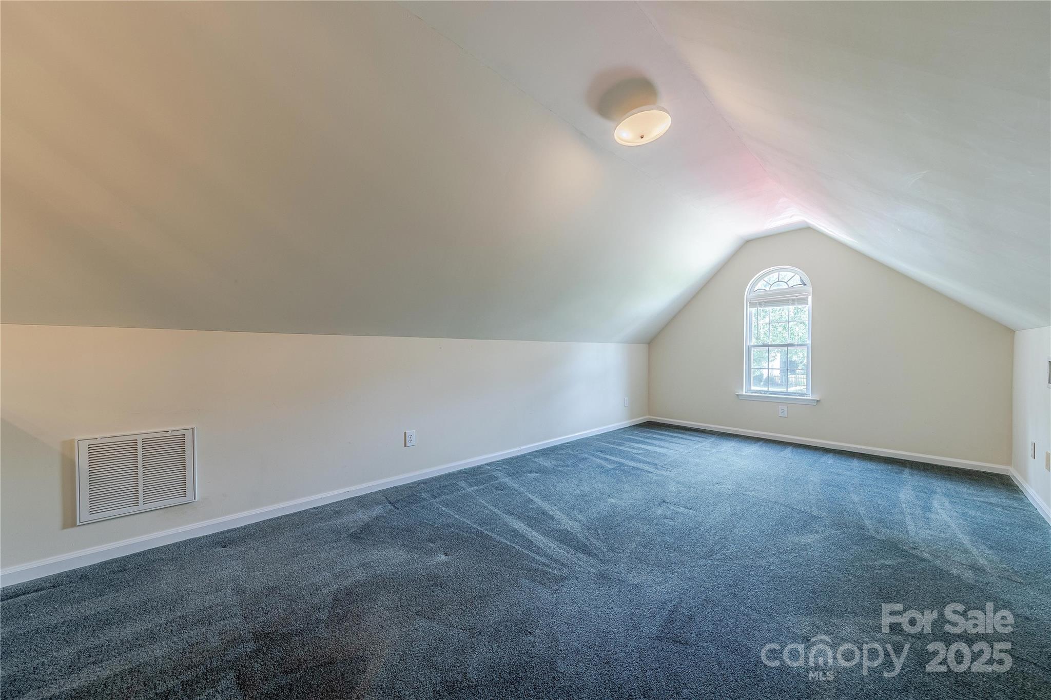 901 Clearbrook Road Matthews, NC 28105 - Photo 27 of 37 an empty room with a empty space and window