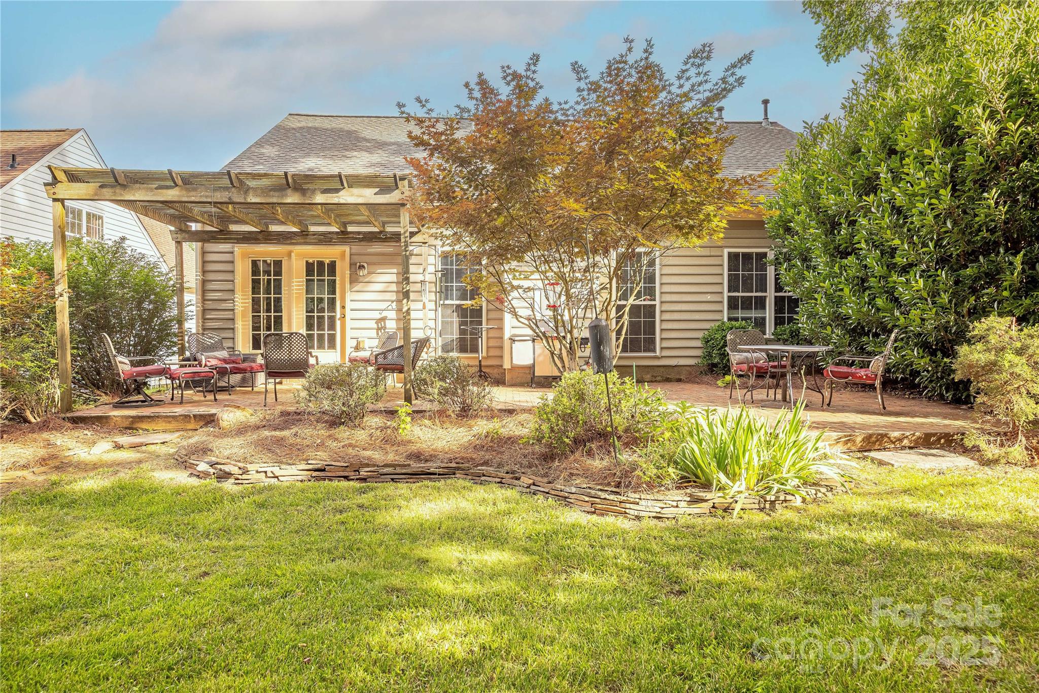 901 Clearbrook Road Matthews, NC 28105 - Photo 32 of 37 a view of a house with a swimming pool
