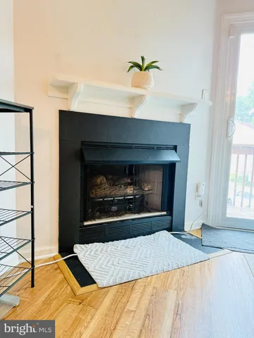 a living room with a fireplace