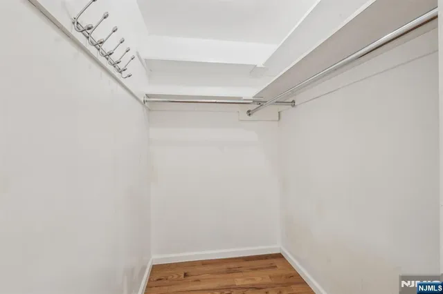 a view of a room with racks on the wall