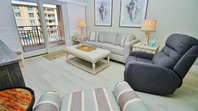 a living room with furniture and a window