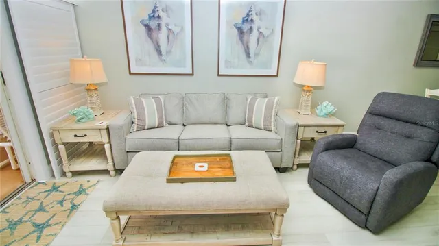 a living room with furniture and a couch