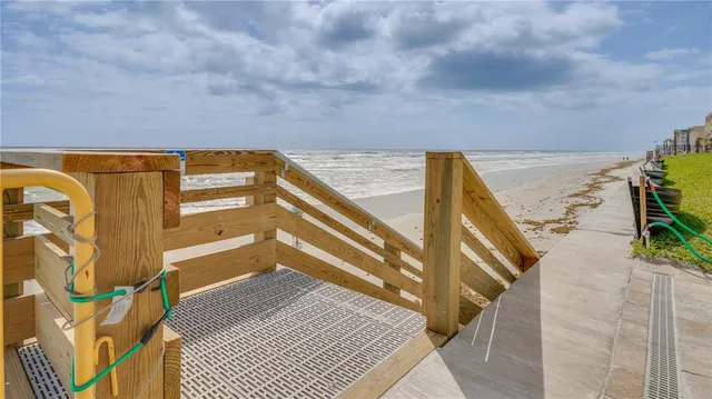 a view of balcony with furniture