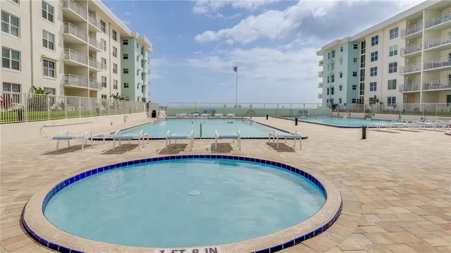 a view of a swimming pool with outdoor space