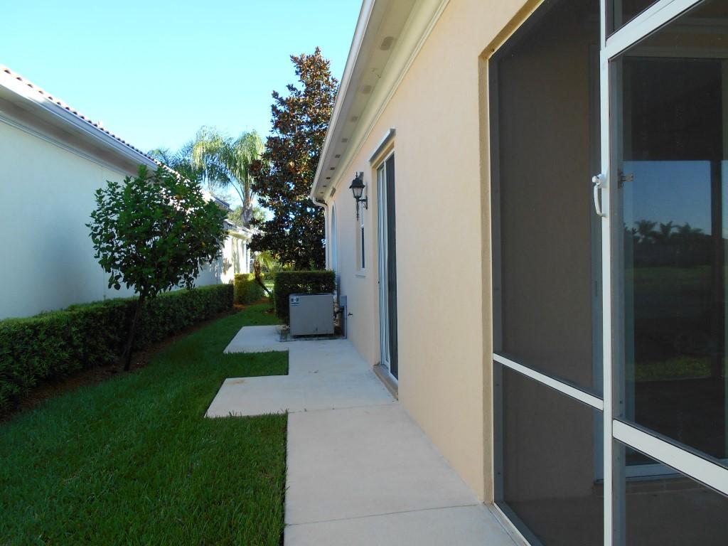 8174 Pine Cay Road Wellington, FL 33414 - Photo 10 of 12 side