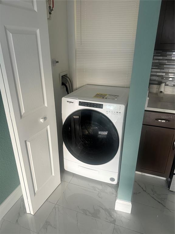 6740 Dairy Road Zephyrhills, FL 33542 - Photo 8 of 8 a close up view of a washer and dryer