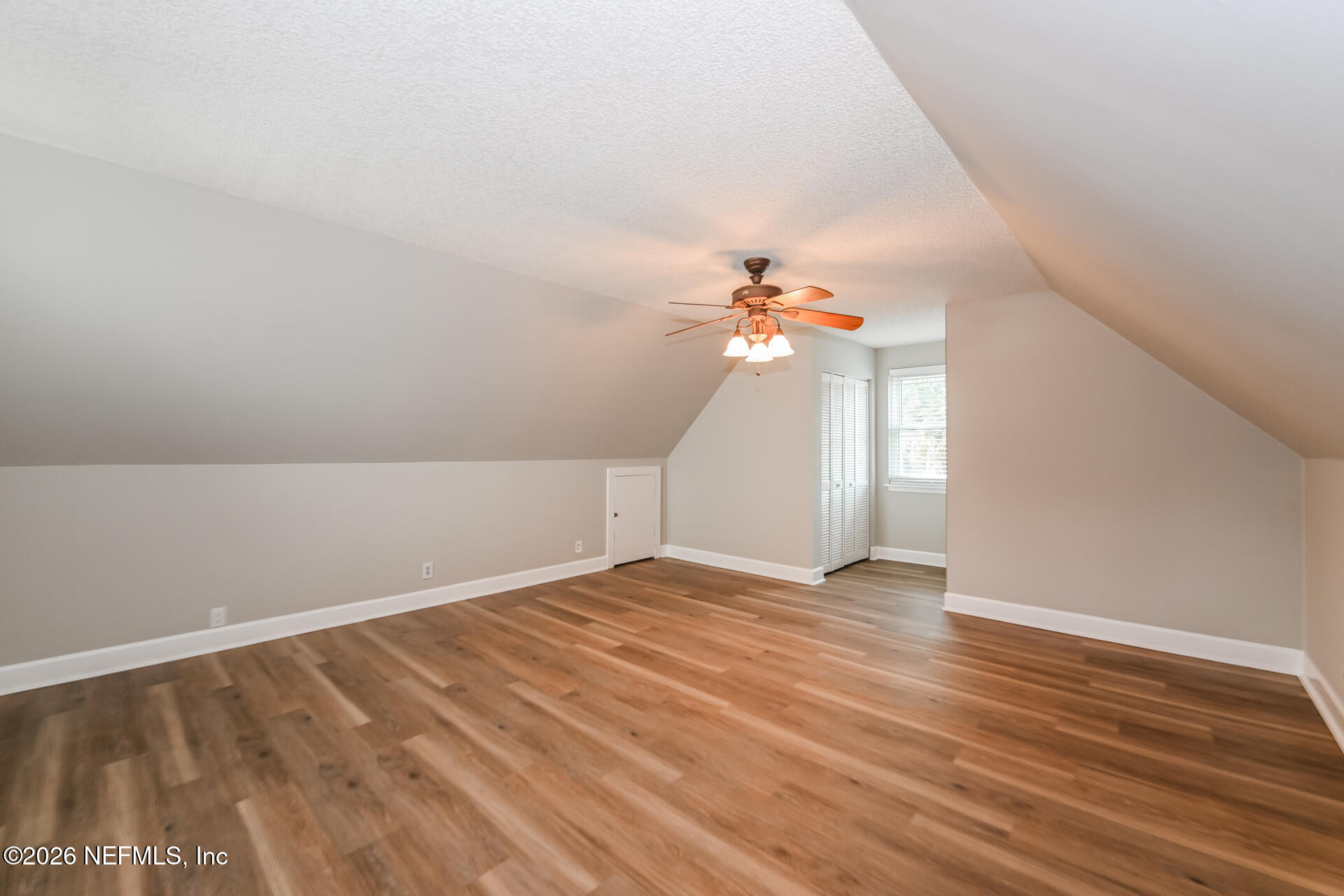 1077 Kings Road Neptune Beach, FL 32266 - Photo 12 of 19 a view of empty room with wooden floor