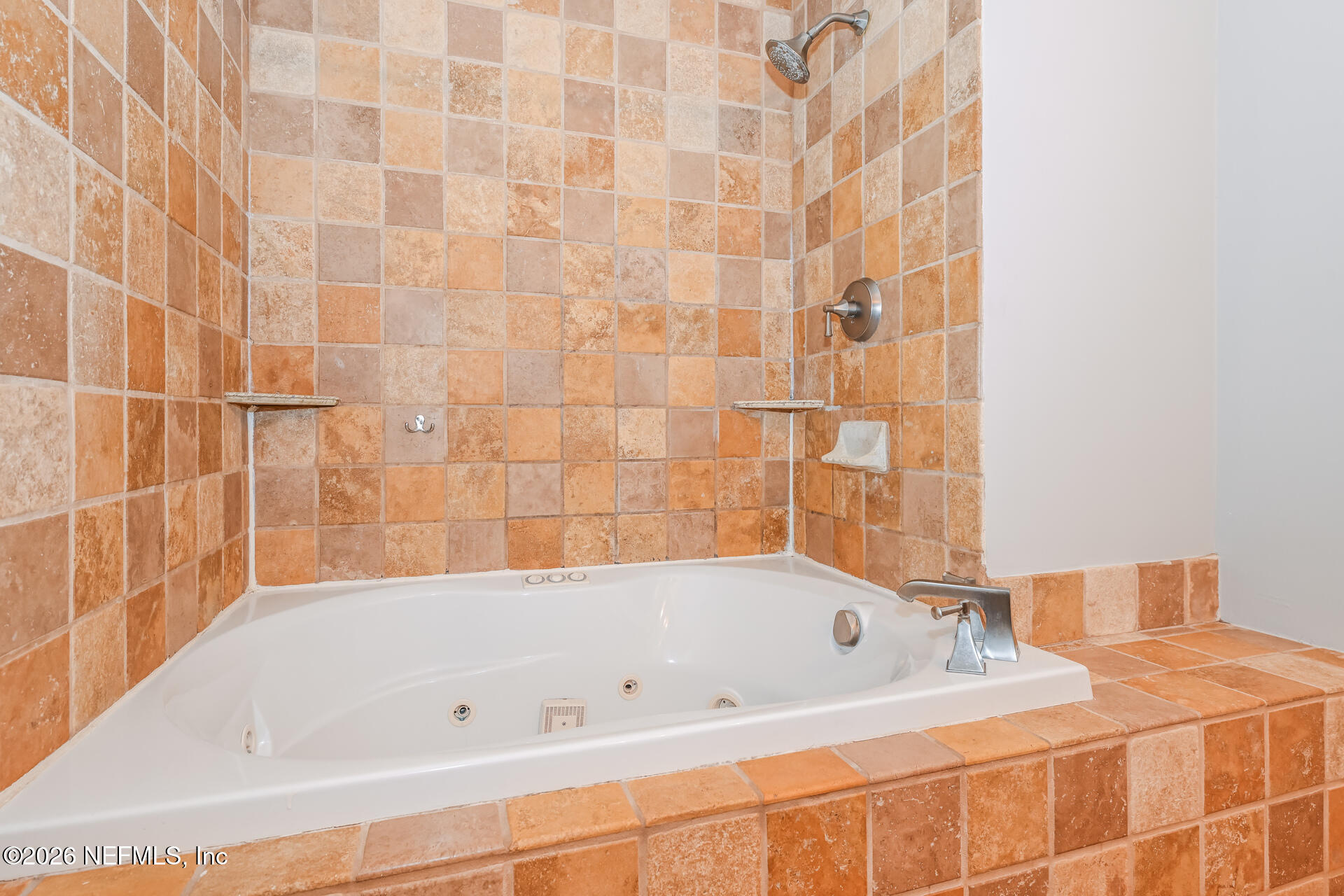 1077 Kings Road Neptune Beach, FL 32266 - Photo 19 of 19 a bathroom with a bathtub