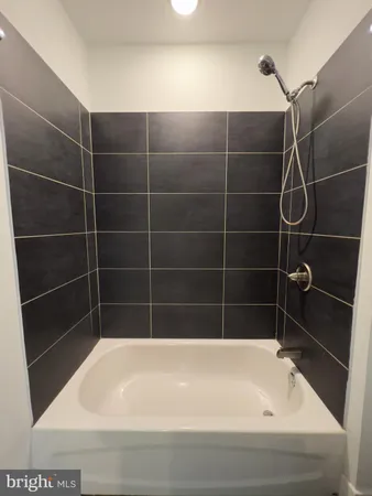 a bathroom with a bathtub