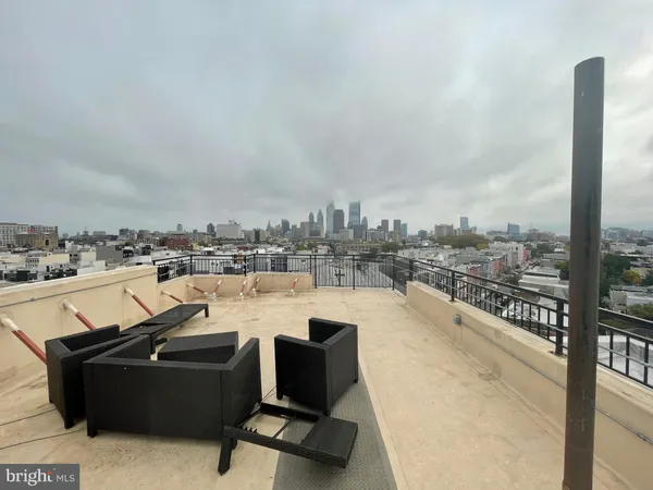 a view of a terrace with seating space