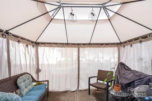 a living room with a couch and a window