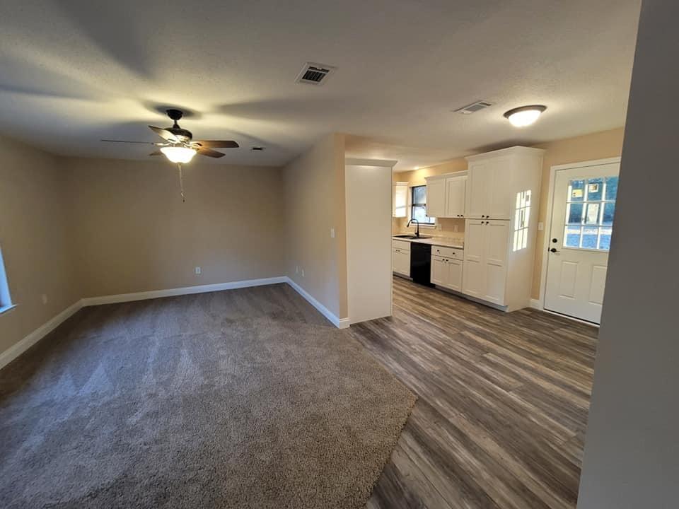 3526 Auburn Road Crestview, FL 32539 - Photo 2 of 11 a view of a kitchen with a sink and a refrigerator