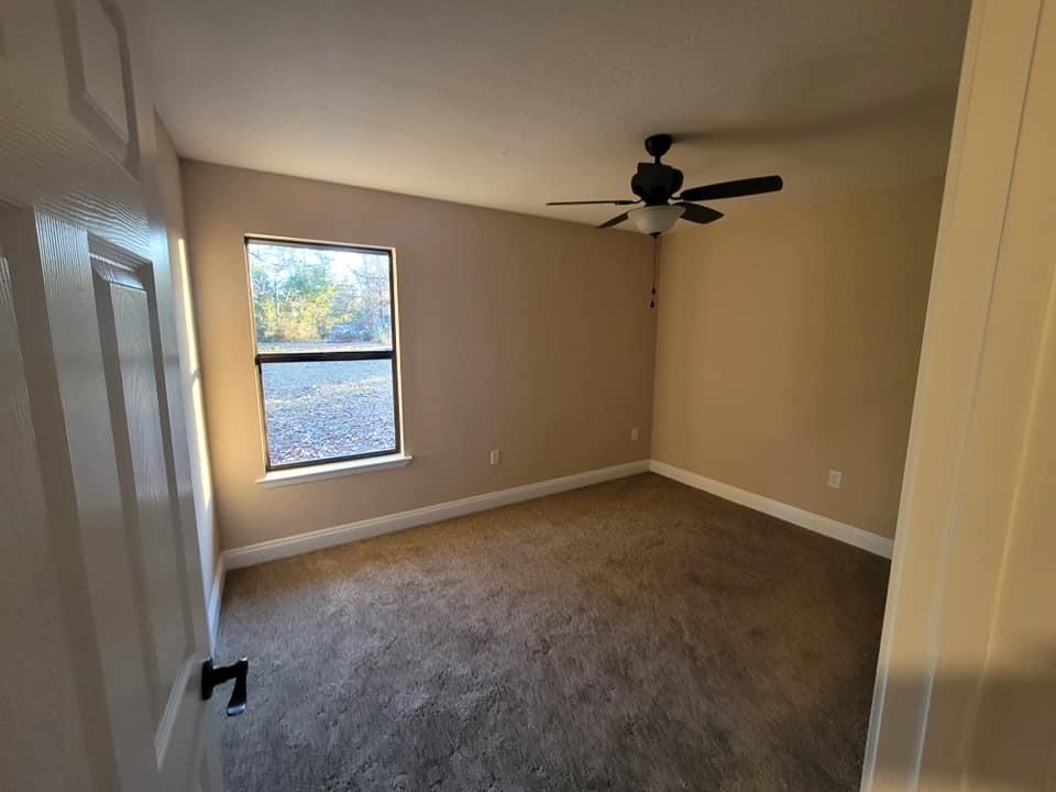 3526 Auburn Road Crestview, FL 32539 - Photo 6 of 11 a view of empty room with windows