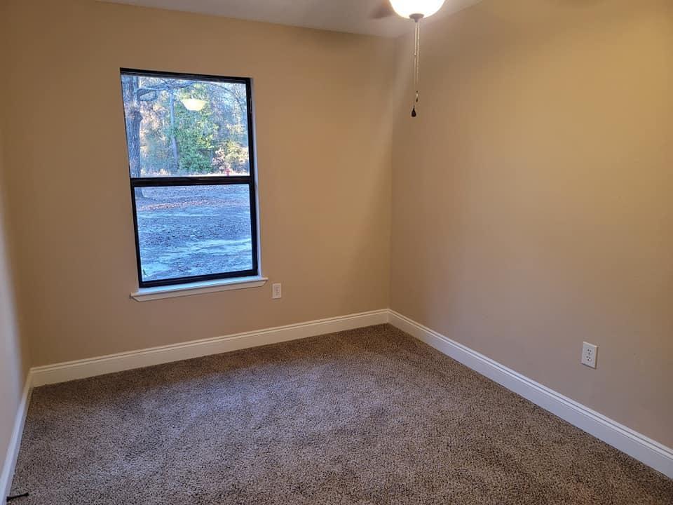 3526 Auburn Road Crestview, FL 32539 - Photo 7 of 11 an empty room with a window