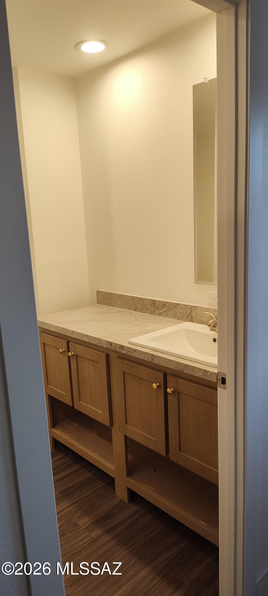 18565 West McClean Road Marana, AZ 85653 - Photo 28 of 37 a view of an empty room with wooden floor and a window
