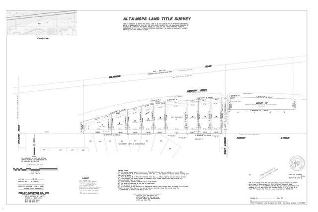 a black and white photo of a beach