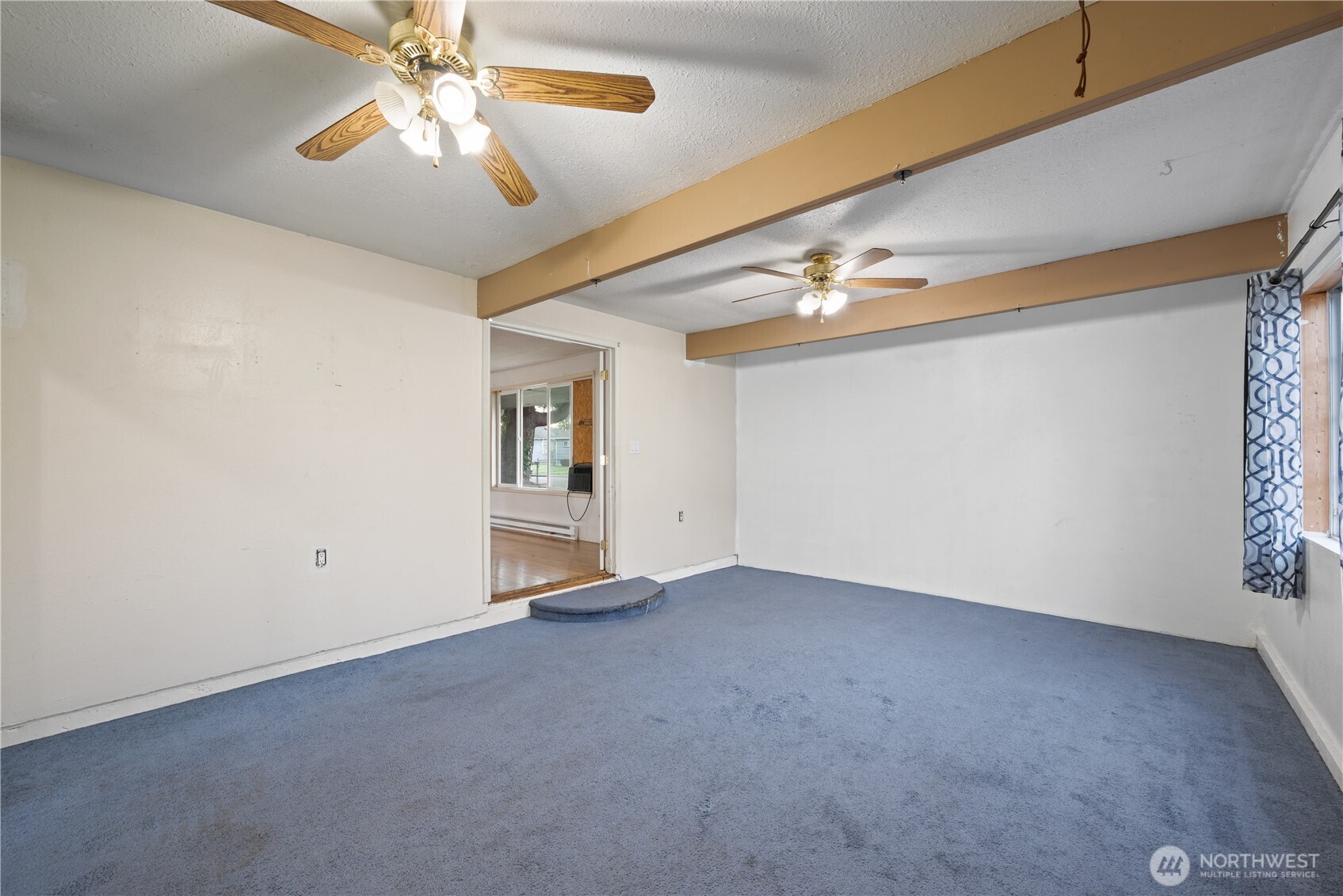 359 Douglas Street Longview, WA 98632 - Photo 11 of 29 a view of an empty room with a window