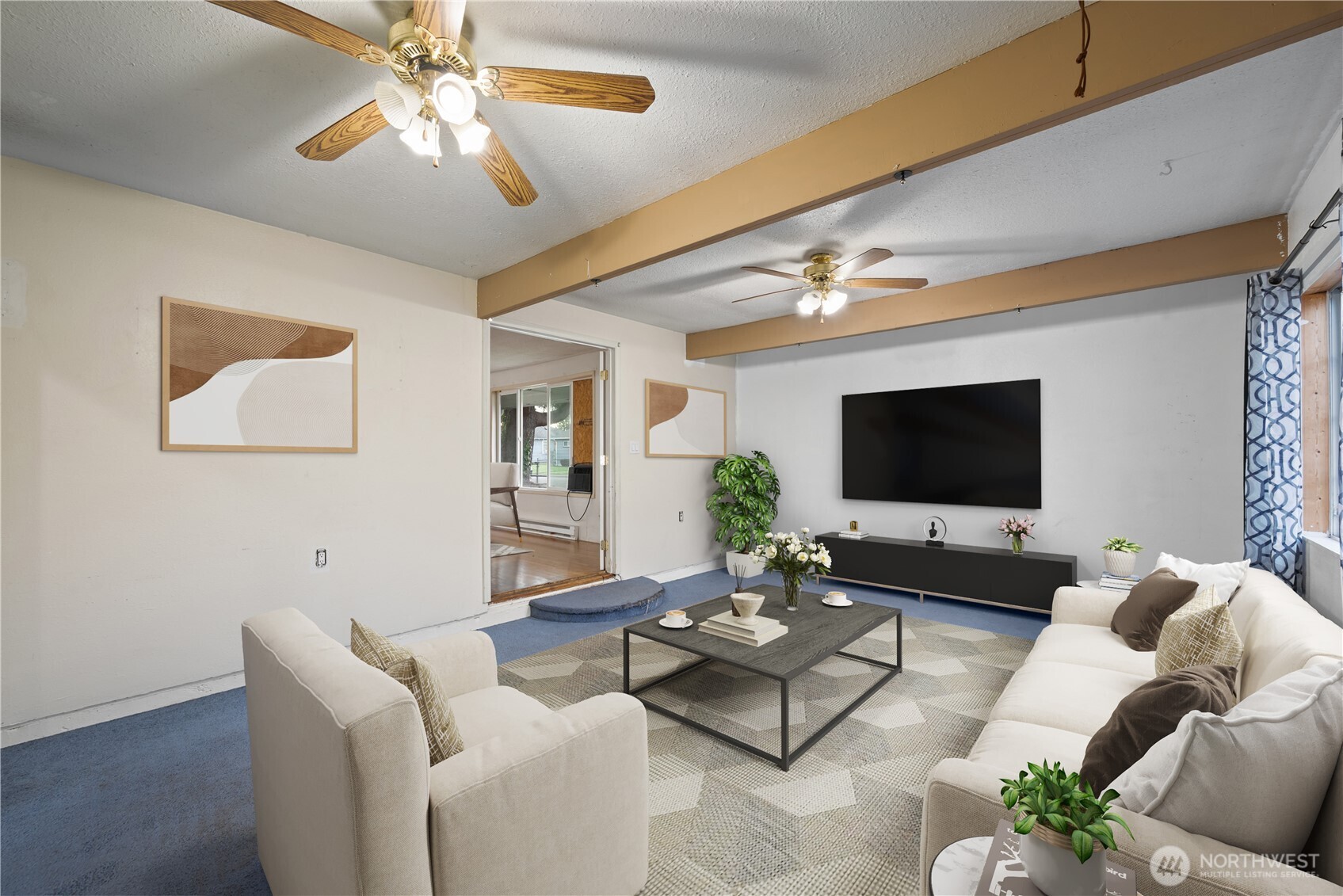 359 Douglas Street Longview, WA 98632 - Photo 12 of 29 a living room with furniture a flat screen tv and a chandelier