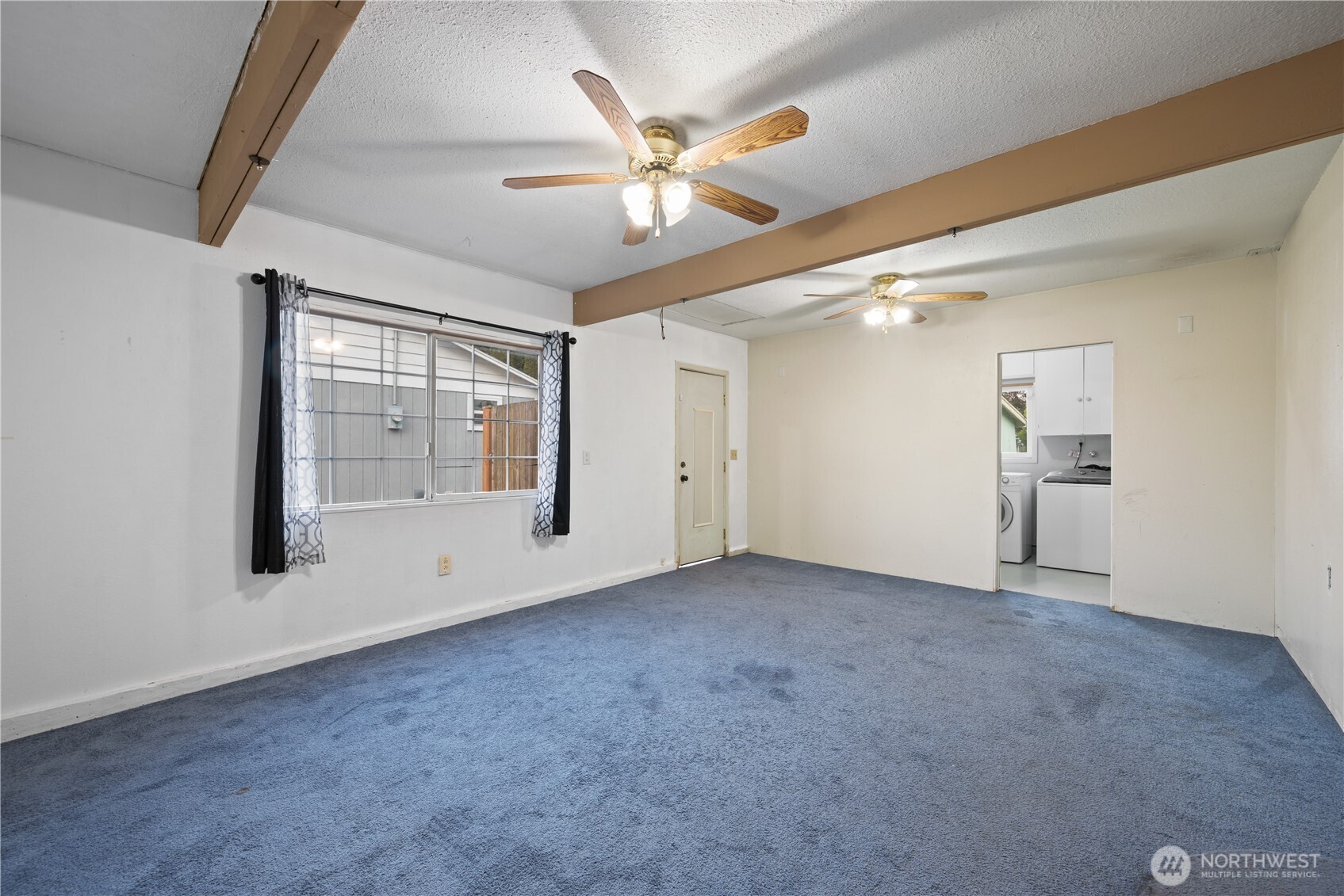 359 Douglas Street Longview, WA 98632 - Photo 10 of 29 a view of an empty room with a window