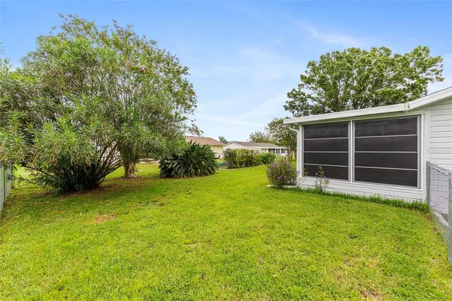 a front view of a house with garden and porch