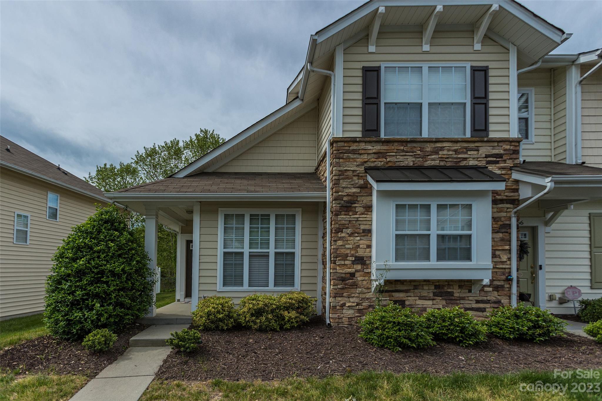 968 Copperstone Lane Fort Mill, SC 29708 - Photo 1 of 13 a front view of a house with garden