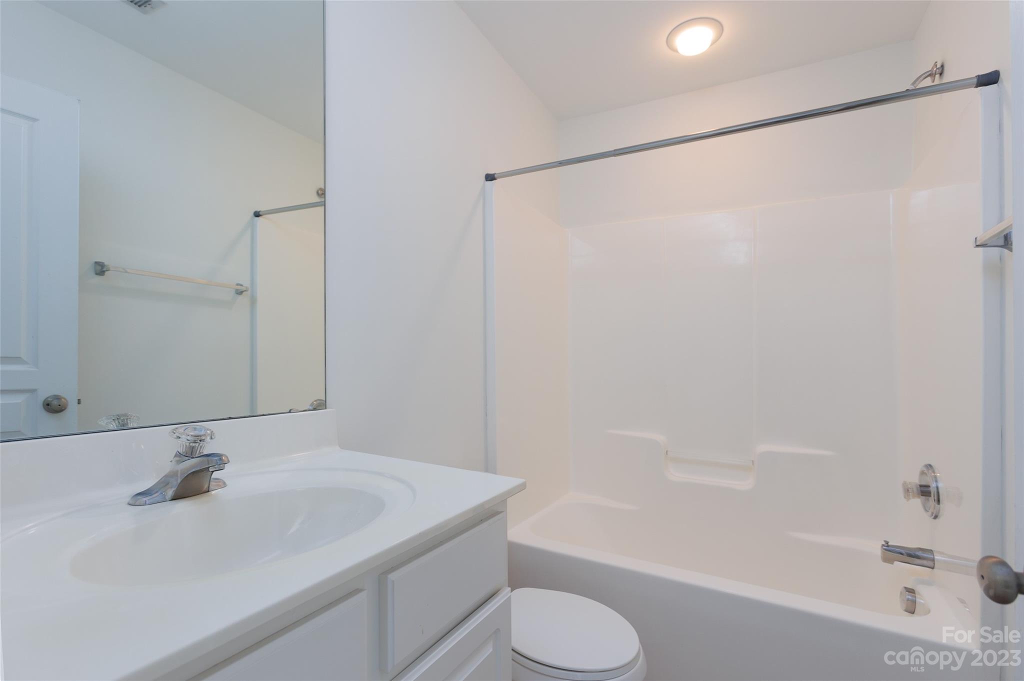 968 Copperstone Lane Fort Mill, SC 29708 - Photo 12 of 13 a bathroom with a sink toilet and shower