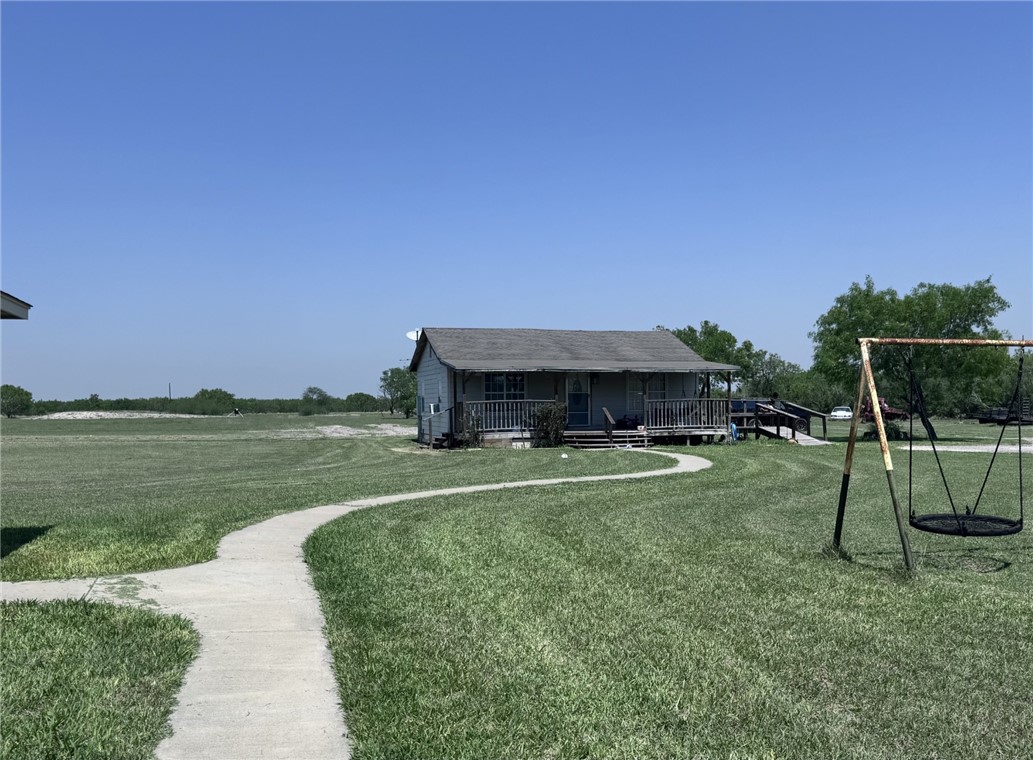 527 Coyote Ranch Alice, TX 78332 - Photo 17 of 17 a view of a garden and basketball court