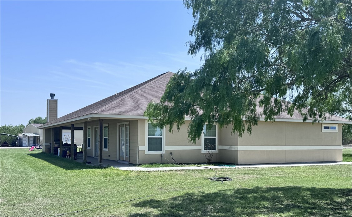 527 Coyote Ranch Alice, TX 78332 - Photo 3 of 17 a view of a house with a yard