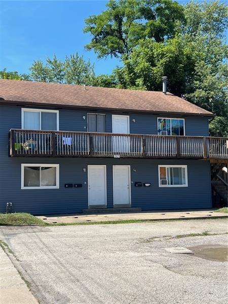 301 West Maiden Street Washington, PA 15301 - Photo 1 of 14 a front view of a house with a garden