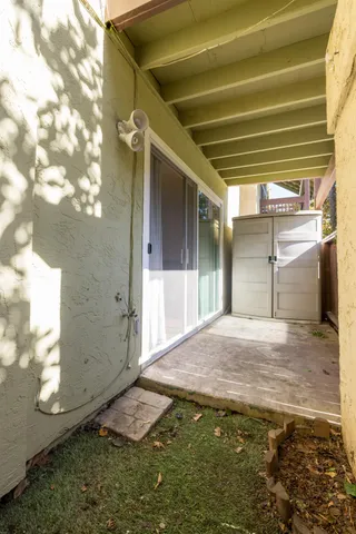an aerial view of a house with yard swimming pool and outdoor seating