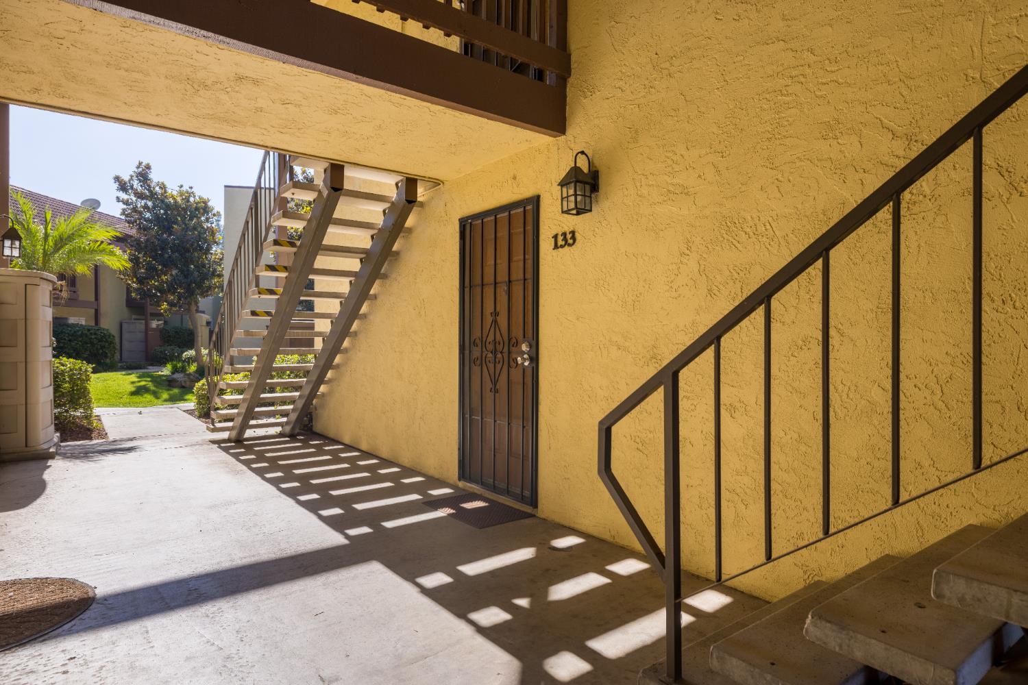 2909 Huntington Boulevard, Unit 133 Fresno, CA 93721 - Photo 19 of 19 a view of stairs and an entrance