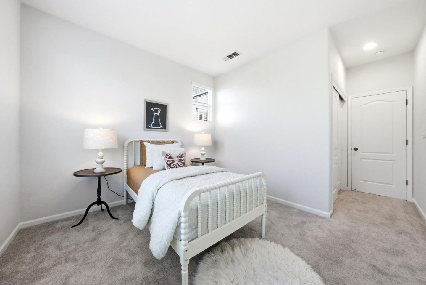 2556 Harlow Lane San Ramon, CA 94582 - Photo 42 of 62 a bedroom with a bed and a lamp